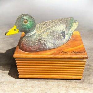 Duck Figurine on Wooden Box